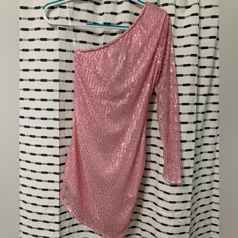 Sequin one shoulder dress.